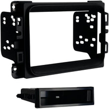 Load image into Gallery viewer, Metra 99-6518B Dash Kit For select 2013-up Dodge Ram pickups without the factory 8" monitor single DIN radios (Black)
