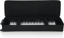 Load image into Gallery viewer, Gator Cases GK-76 Lightweight Keyboard Case with Pull Handle and Wheels; Fits 76-Note Keyboards