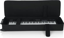 Load image into Gallery viewer, Gator Cases GK-76 Lightweight Keyboard Case with Pull Handle and Wheels; Fits 76-Note Keyboards