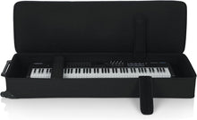 Load image into Gallery viewer, Gator Cases GK-76 Lightweight Keyboard Case with Pull Handle and Wheels; Fits 76-Note Keyboards